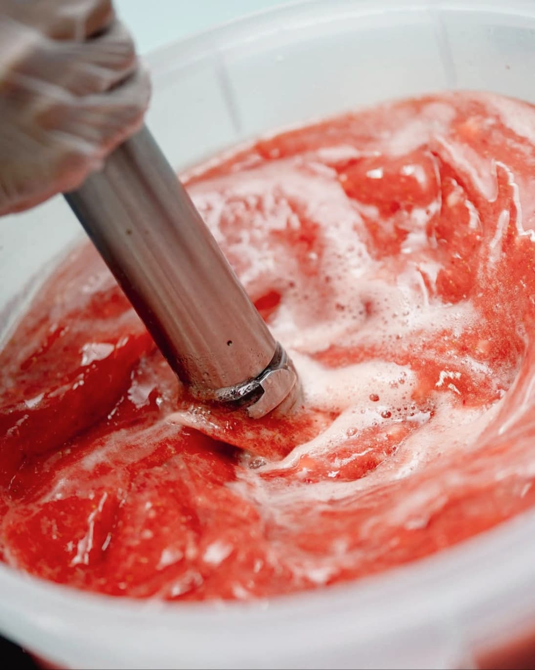 Strawberry puree being blended
